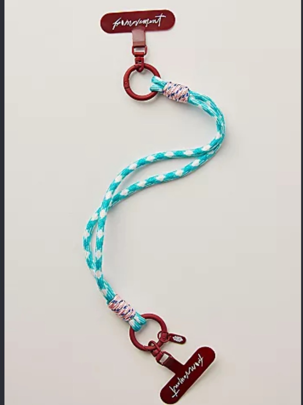 9389. Free People Wrapped Cord Phone Wristlet